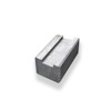 Grå rektangulär betongblock med en slät ovansida och strukturerade sidor.