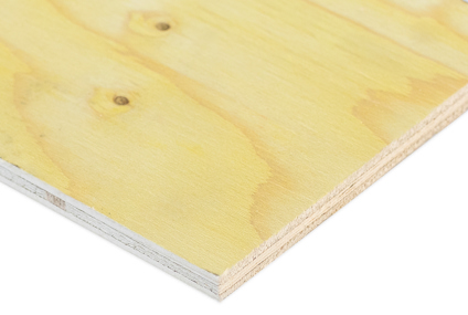 Närbild på en kant av en blindbottenplywoodskiva med synlig trästruktur och ljusgul yta.