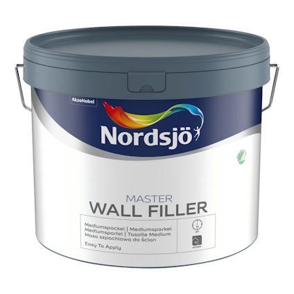 Färgpyts med texten "Nordsjö MASTER WALL FILLER" och en färgglad logotyp på framsidan.
